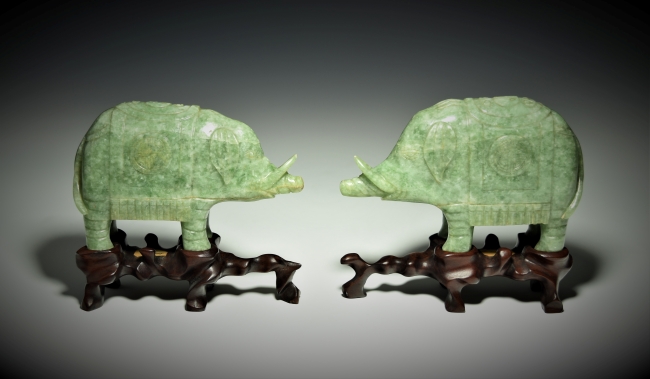 PAIR OF JADEITE ELEPHANT FIGURINES ON HARDWOOD STANDS